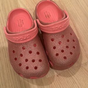 Pink glitter crocs - used